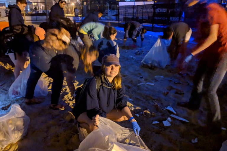 Volunteers from Howard Payne University participate in a nighttime beach cleanup effort. | HPU