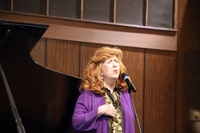 Photo 1 -Clawson performing for web
