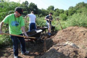 HPU students serve at the Brownwood Area Community Garden for the university’s annual Serving With A Right Motive (S.W.A.R.M.) project.