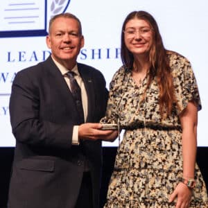 HPU student Hannah Parnell receives the Howard Payne University Servant Leadership Award, presented by Dr. Cory Hines, HPU president.