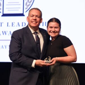 HPU student Georgia Simmons receives the Howard Payne University Servant Leadership Award, presented by Dr. Cory Hines, HPU president.
